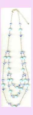wholesale beaded jewlery - beaded necklace of light green and purple in color   