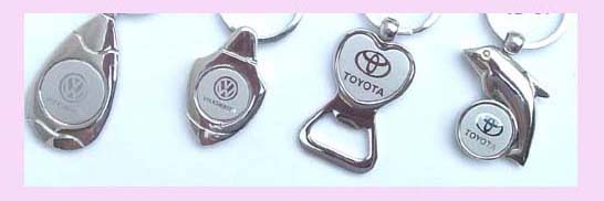 wholesale gift supplier - available various silver keychains with dealership logos and names   